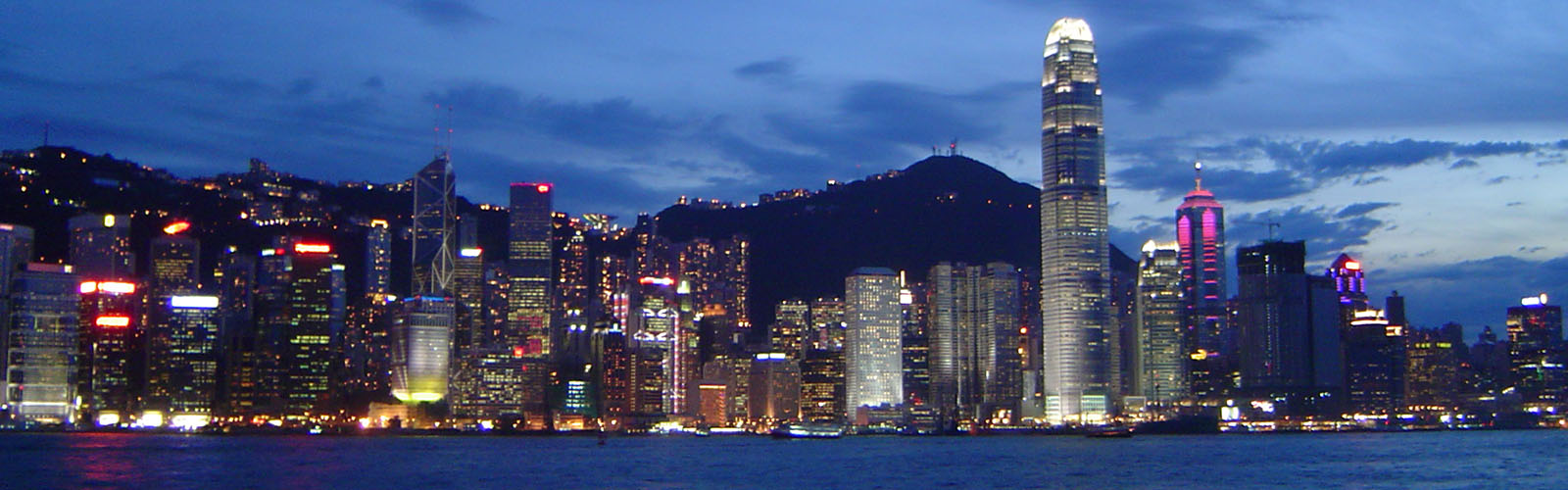 The skyscrapers of Hong Kong full of colorful lights at night. 